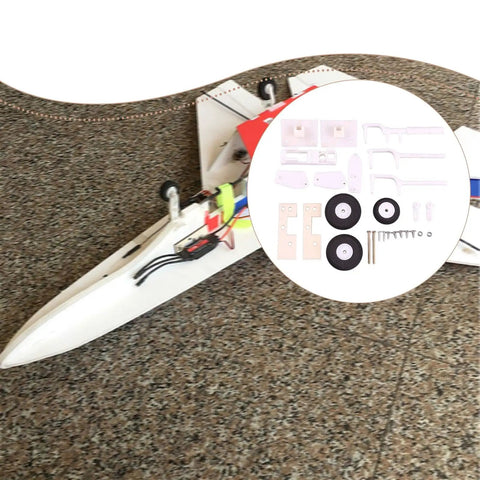 RC Airplane Landing Gear Kit With Shock Absorbing Nylon Fittings shown with installation components and model airplane