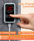 Close-up of hand using controller on Under Desk Foot Warmer With 12 Hour Timer 8 Heat Levels Foldable Portable Space Heater for Legs and Feet.