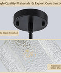 BOKUNOFU Glass Pendant Light Kitchen Island, close-up of hammered glass shade with matte black fixture and visible bulb.