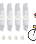 4 Pack Bike Spoke Reflectors For Night Riding Safety High Visibility Wheel Reflectors For Mountain And Road Bikes Easy To Install Boosts Visibility On Dark Roads, showing four white clip-on reflectors with a cyclist.