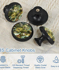 Four Pack Black Map Block Cabinet Pulls with multicolored map design, matte black hardware on fabric
