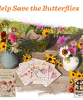 Bentley Pollinator Mix Ready-To-Sow Wildflower Seeds Packets with colorful flowers on a wooden table for butterfly gardens