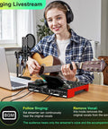 Person using G10 All In One Podcast Studio Bundle with Plug And Play Integrated Mixer and P15 Microphone for live streaming guitar session.