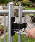 Built Tough Heavy Duty Carbon Steel Gate Hinges Featuring Removable Pin Design For Backyard Gates, shown in use on a chain link gate.