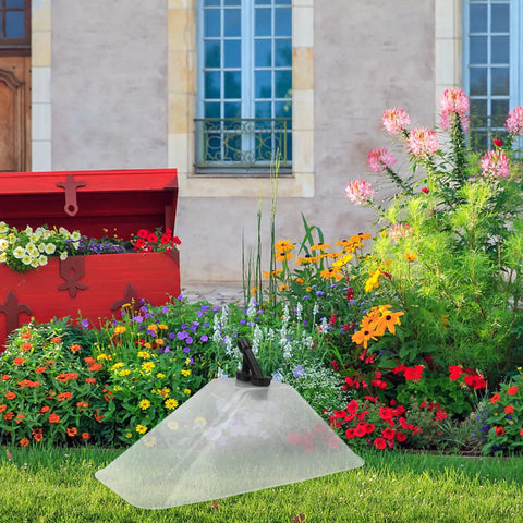 Windproof Dual Head Sprayer Nozzle Cover For Farm And Lawn Irrigation in a colorful garden setting
