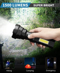 Hand holding Solar Powered 1500 Lumen Flashlight Handheld For Camping Survival And Emergencies IP65 Waterproof