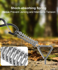 Close-up of RV Awning Tie Down Kit with shock-absorbing spring detail and text 'Shock-absorbing Spring Helps Prevent Jerking and Maintains Tension'.