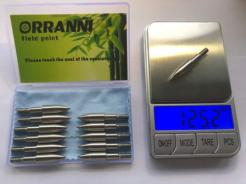 Stainless Steel Archery Field Points With Screw In Tips 19/64 Inch Outside Diameter 125 Grain 1 Dozen Dead On Precision Tolerances Plus Or Minus.001 For Consistent Weight And Diameter Across Most Shafts displayed on scale with 125.2 grain weight reading