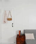 Over The Door Hooks White 6 Pack Towel Rack And Coat Hanger For Back Of Door Organization Fits Doors From One And Three Eighths To One And Three Quarters Inches Thick With Soft Sponge Padding To Prevent Scratches installed on white door holding coat and bag
