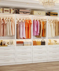 Customizable Four Piece Closet System With Twelve Wooden Drawers And Open Shelves Expands From Eight To Twenty One Feet in bright interior.