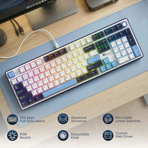 Wired Full Size Mechanical Gaming Keyboard with 104 Keys and Premium Metal Volume Knob Featuring Five Layer Sound Dampening for Hella Smooth Taps and Fire Rapid Response Time on a desk.