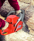 Person using 62cc Gas Chainsaw With 18 Inch Bar, Two Stroke Gasoline Power Chain Saw for cutting logs outdoors