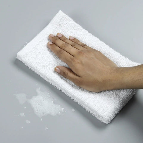 Hand using Bar Mop Towels Bulk Pack 24 16 By 19 Inches Absorbent Durable Cotton Cleaning Rags For Kitchen Restaurant Bar Home Multipurpose Terry Cloth Towels White.