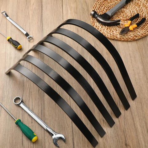 Six Pack Heavy Duty Rock Rake Tines Replacement For Landscape Rakes One Inch By Five Sixteenth Inch One Bolt Mount Heat Treated Steel Clam Rake Tines For Yard Maintenance And Restoration Upgrade displayed on a wooden surface with tools.
