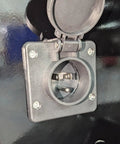 Close-up of the mounting outlet on 12V 10 Amp Panel Mount Battery Charger For Onboard Trickle Charging In Hydraulic Dump Trailers