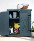 Weatherproof Outdoor Storage Cabinet for Patio and Garden with Shelves and Heavy Duty Metal Tabletop and Wooden Potting Table Workstation Built to Last and Easy Assembly showing opened doors with garden tools inside.