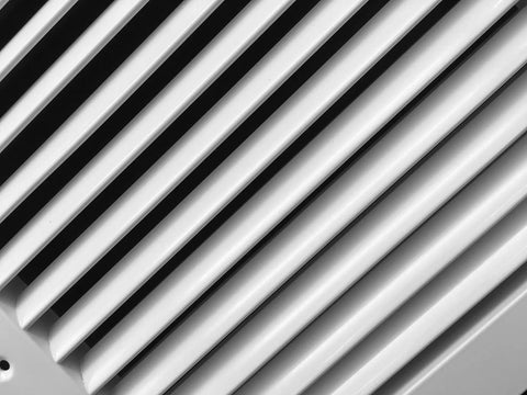 Close-up of Aluminum Return Grille for Duct Opening 26 by 8 Inches with Outer Dimensions 27.875 by 9.875 Inches, Linear Bar Design