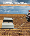 Heavy-Duty Tow-Behind Drag Harrow Driveway Grader For Gravel And Dirt, 8 Ft Power Rake attached to red tractor on dirt field