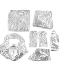 Heavy Duty Aluminum Foil Heat Insulated Suit Takes The Heat At 1200 Degrees Fire Retardant Industrial Safety Gear ensemble pieces laid out.