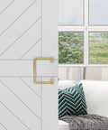 Troy Pull Handle N700-105 For Interior Sliding Barn Doors 8 Inch Brushed Gold Finish installed on wood barn door.