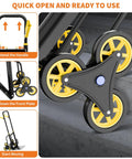 Heavy Duty Stair Climbing Hand Truck With 440 Lbs Capacity Featuring Six Swivel Wheels Telescopic Handle in use on stairs.