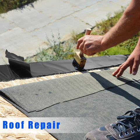 Close-up of a person applying Two Rolls Asphalt Crack Filler Tape, 3.15 Inch Wide, 50 Feet Each on a roof for repair, weatherproof sealer