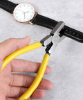 Leather Hole Punch Tool Plier For Belts Watch Bands Shoes And Leather Crafts One Hand Operation in use on a black leather watch band