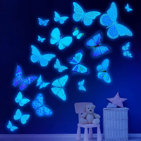 Luminous Butterfly Wall Stickers Set With 58 Pcs Phosphorescent Colorful Wall Art for Kids Room glowing on dark blue wall
