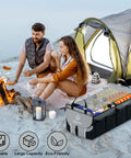 Heavy Duty Car Trunk Organizer For SUV With 63L 26L Modular Storage Foldable Waterproof Non Slip Multi Compartment Soft And Hard Covers Black M006 For Daily Use And Road Trips beside a tent at a campsite.