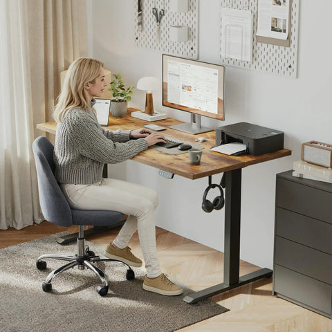 Electric Standing Desk 48 Inch Height Adjustable Sit Stand Desk For Home Office With Memory Presets, Rustic Brown, in use