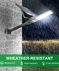 Solar Street Light Outdoor 15000 Lumen Flood Light IP67 Waterproof With Remote Control mounting on brick wall in rain
