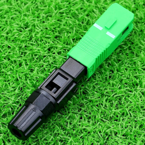 SC/APC fiber optic quick-connect adapter, green housing with black plug for CATV networks