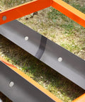 Close-up of Heavy Duty 72 Inch Tractor Land Leveler Scraper Grader Attachment dual blades on grassy terrain