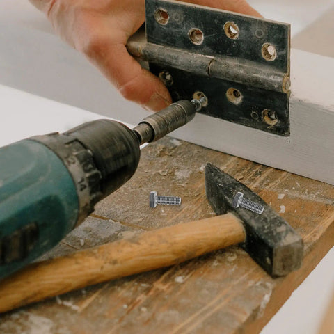 Person using drill on hinge with 20 Piece M6 Stainless Steel Hex Bolts And Nuts Kit With 16mm Thread Length Carriage Bolts And Flat Washers
