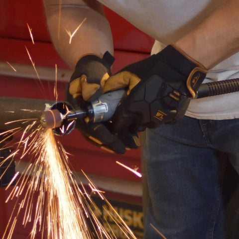 Tough As Nails Straight Pneumatic Die Grinder delivers a blistering 25000 RPM for polishing, shown in use with sparks flying.