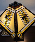Mission Banker Style Stained Glass Table Lamp 23 Inch Tall with white, tan, brown, and yellow tribal glass shade, top view.