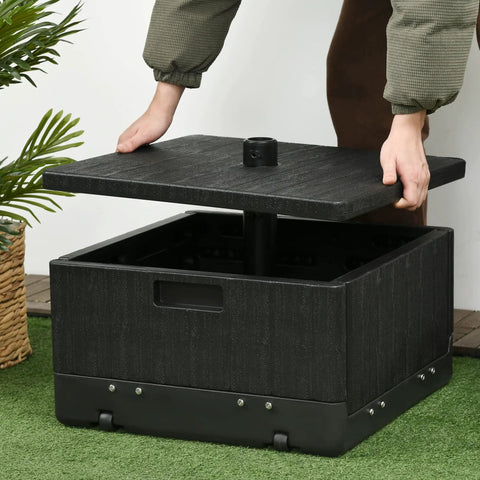Person lifting lid of 2 In 1 Outdoor Umbrella Base Planter Box With Drain Hole Heavy Duty Fillable Stand Table On Wheels