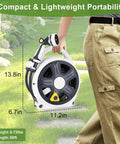 Person carrying Workhorse Retractable Garden Hose Reel With 60 Ft 1/2 Inch Hose And 10 Pattern Sprayer, compact design