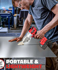 Person using Cordless Sheet Metal Cutter Nibbler with 221 Foot Pounds of Torque cuts 18 gauge steel smoothly in workshop