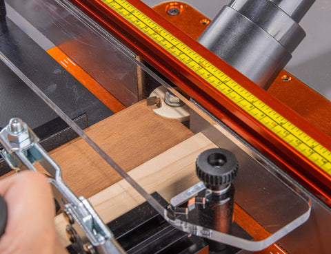 Close-up of Pro Grade Rail Coping Sled Router Table Jig for cabinet doors, showing precise coping for rail and stile joints.