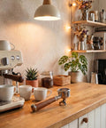 54mm Espresso Portafilter With Two Cup Spouts And Walnut Handle For Breville And Sage Barista Machines on wooden countertop
