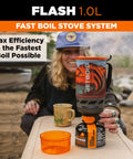 Flash 1.0L Portable Fast Boil Stove for camping, a compact design with auto ignition and safe touch, placed on an outdoor table.