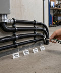 Built Tough Workhorse Corrugated Flexible Conduit Pipe With Compression Fitting Connector For Electrical Cable Routing And Wiring Harness Protection Rated At 20 Bar Pressure In A Sturdy 19 Millimeter Coil installed on wall with various sizes marked.