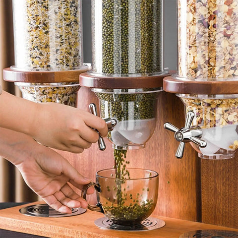 Airtight Cereal Dispenser And Dry Food Storage Container Countertop Organizer No Fuss Game Changer Keeps Oatmeal Coffee Beans Nuts Fresh Smooth Operator crafted from food grade plastic, in use pouring grain into a glass cup.