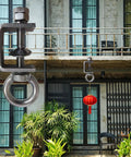 4 Piece Stainless Steel C Clamp With Ring Heavy Duty Hanging J Hooks for outdoor use, supporting a red lantern, garden view