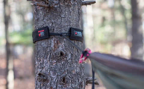 Tree Slings Camping Hammock Hanging Kit With Quick Setup Straps And Tree Friendly Trunk Sleeves Easy Backpacking And Backyard Relaxing attached to tree