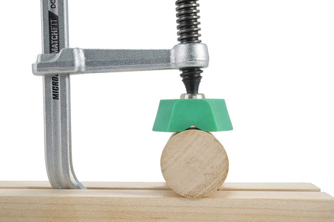 Side view of Matchfit Dovetail Clamps DVC 538K2 with X Pad set clamping a wooden piece, showing grip on 1/2 inch 14° groove.