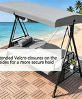Heavy Duty Swing Canopy Cover For 3 Seat Outdoor Swings Waterproof All Weather Patio Shield in gray on beach setup