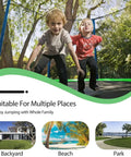 Two kids jumping on 12 Foot Trampoline With Slide And Swings Outdoor Play Set With Basketball Hoop Ladder LED Lights And Net Enclosure.