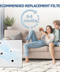 Couple relaxing on sofa with diagram of Vital 100 Replacement Filter for Levoit Vital 100 Air Purifier nearby